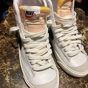 Nike White High-Top Sneakers
New never worn No box